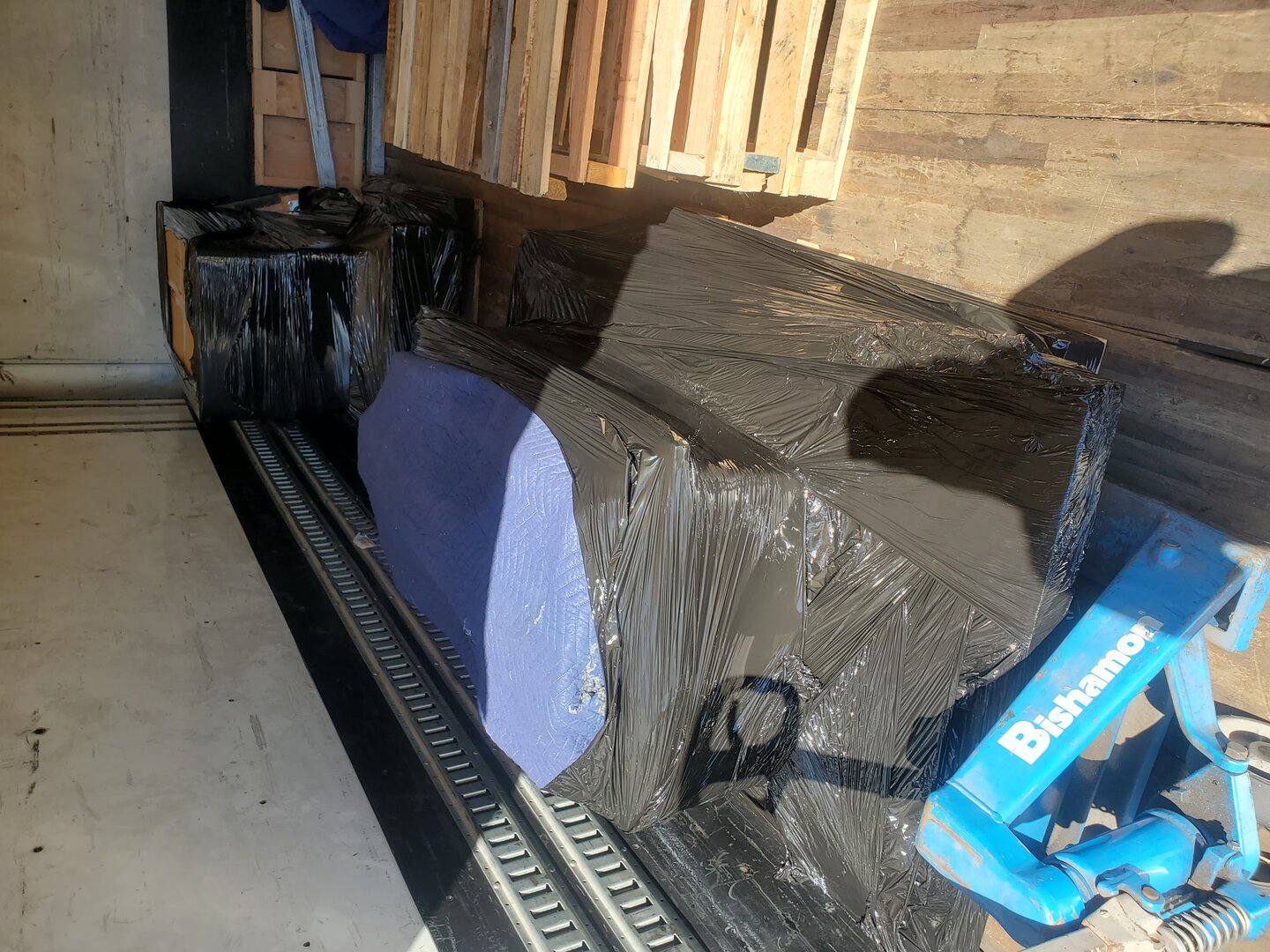 Properly prepared and wrapped items on pallets ready for moving day