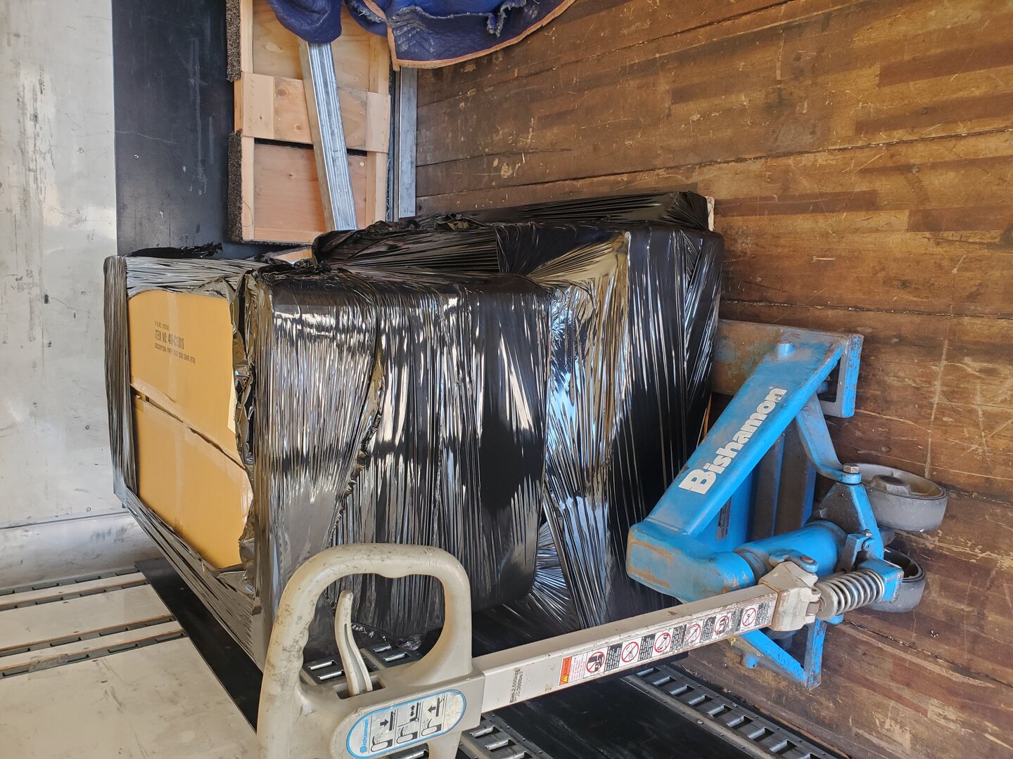 Professional pallet jack and moving equipment used by Locally Swift Transport